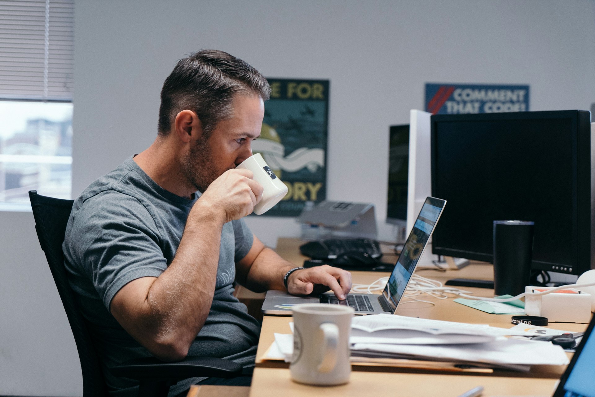 Gabe Cooper drinking coffee